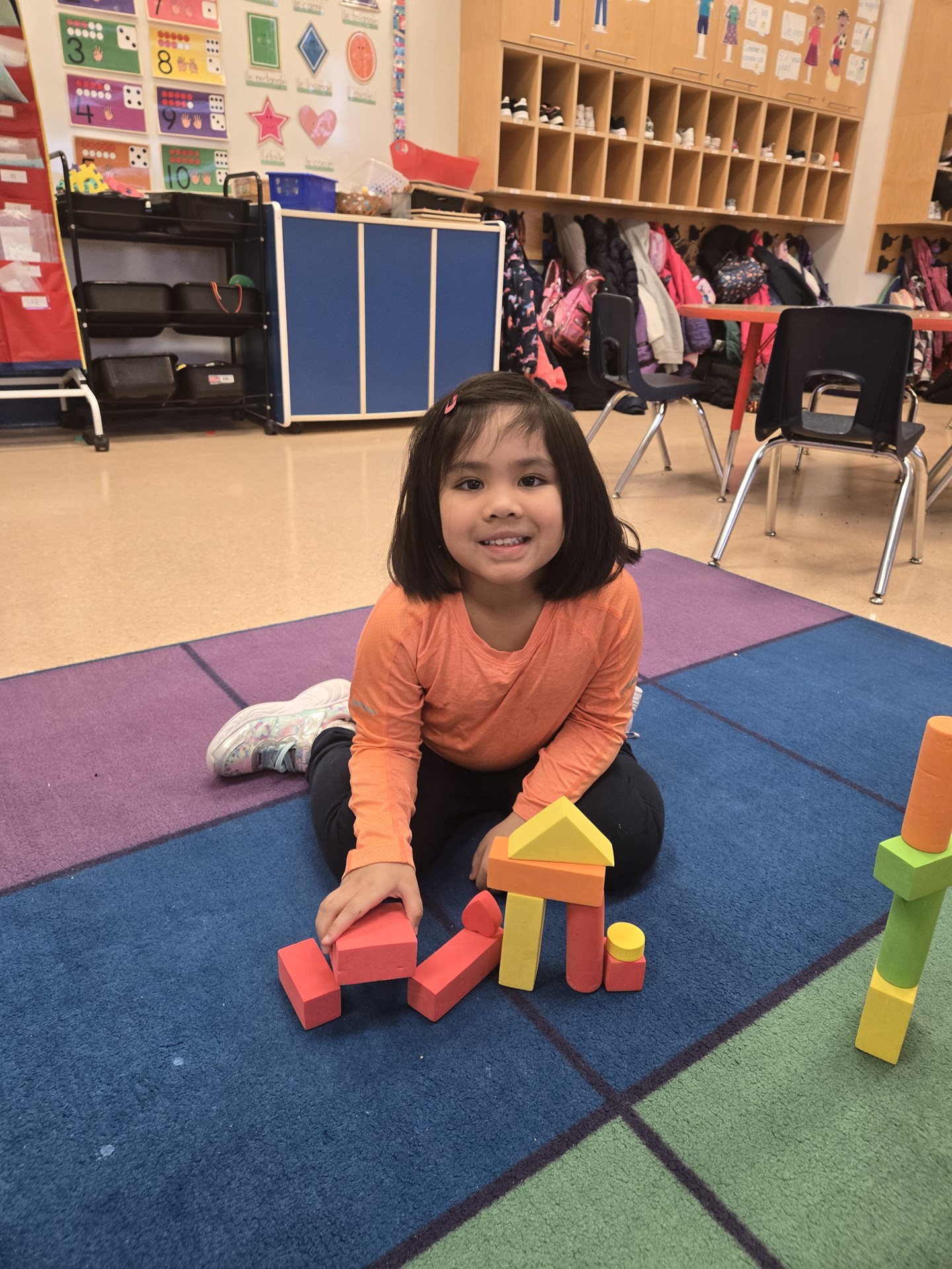 Kindergarten student with blocks.jpg