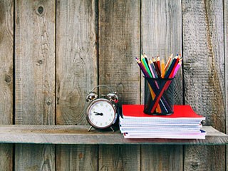 clock with books and pens SQUARE.jpg